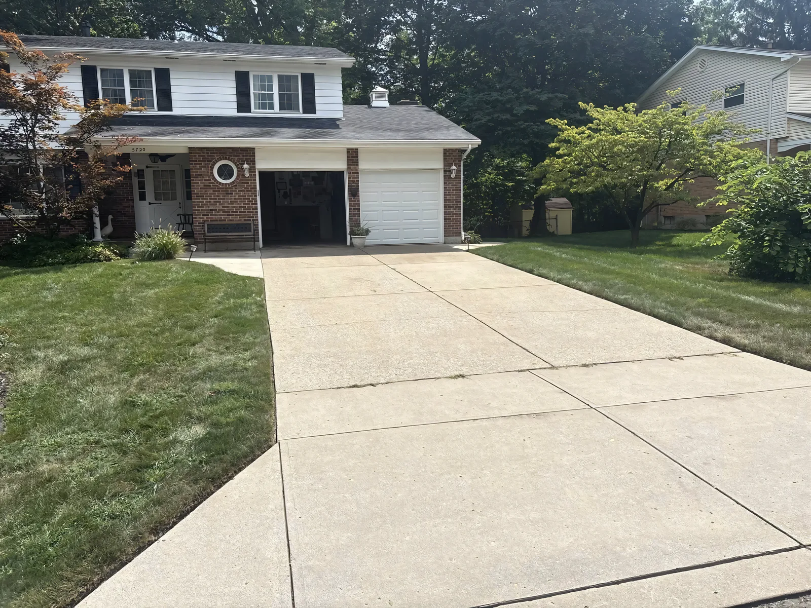 Cleaned driveway from an angle — uniform clean finish across the entire slab